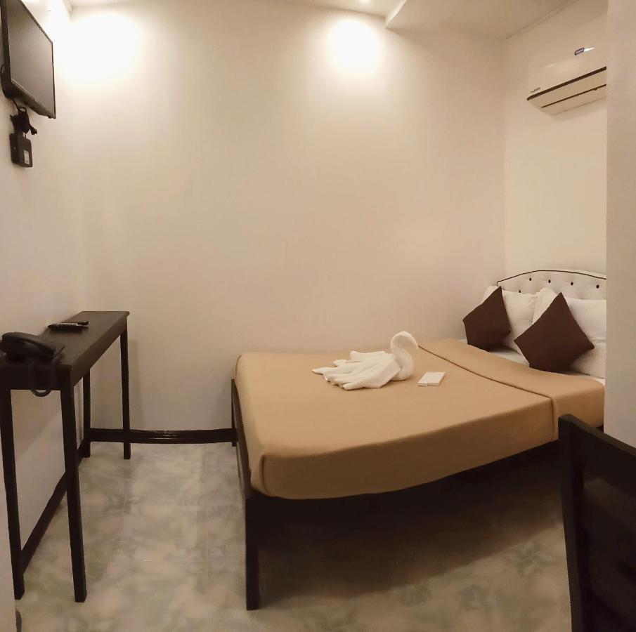 Amax Inn Cebu Мандауэ Экстерьер фото